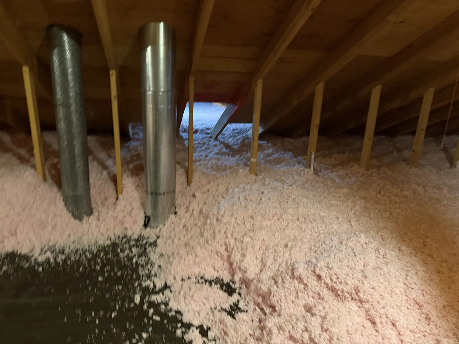 Finished attic with deep new insulation after wildlife remediation